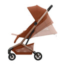 Maxi Cosi Fame Cabin Copper Terra com Barra Frontal