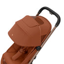 Maxi Cosi Fame Cabin Copper Terra com Barra Frontal