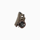 Maxi Cosi Trio Fame Oak Truffle  + Base FamilyFix Slide Pro