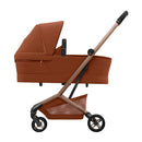 Maxi Cosi Fame Cabin Copper Terra com Barra Frontal